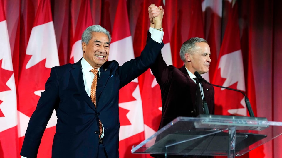 PM Carney welcomes MP Michael Ma to the Liberals at party's caucus holiday party