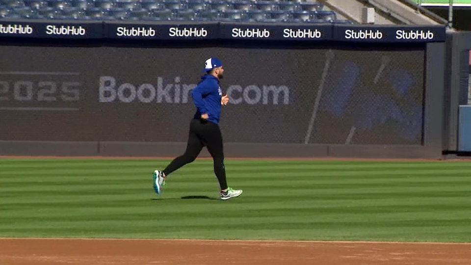 Blue Jays' Bo Bichette jogs on field at Yankee Stadium as he rehabs knee sprain